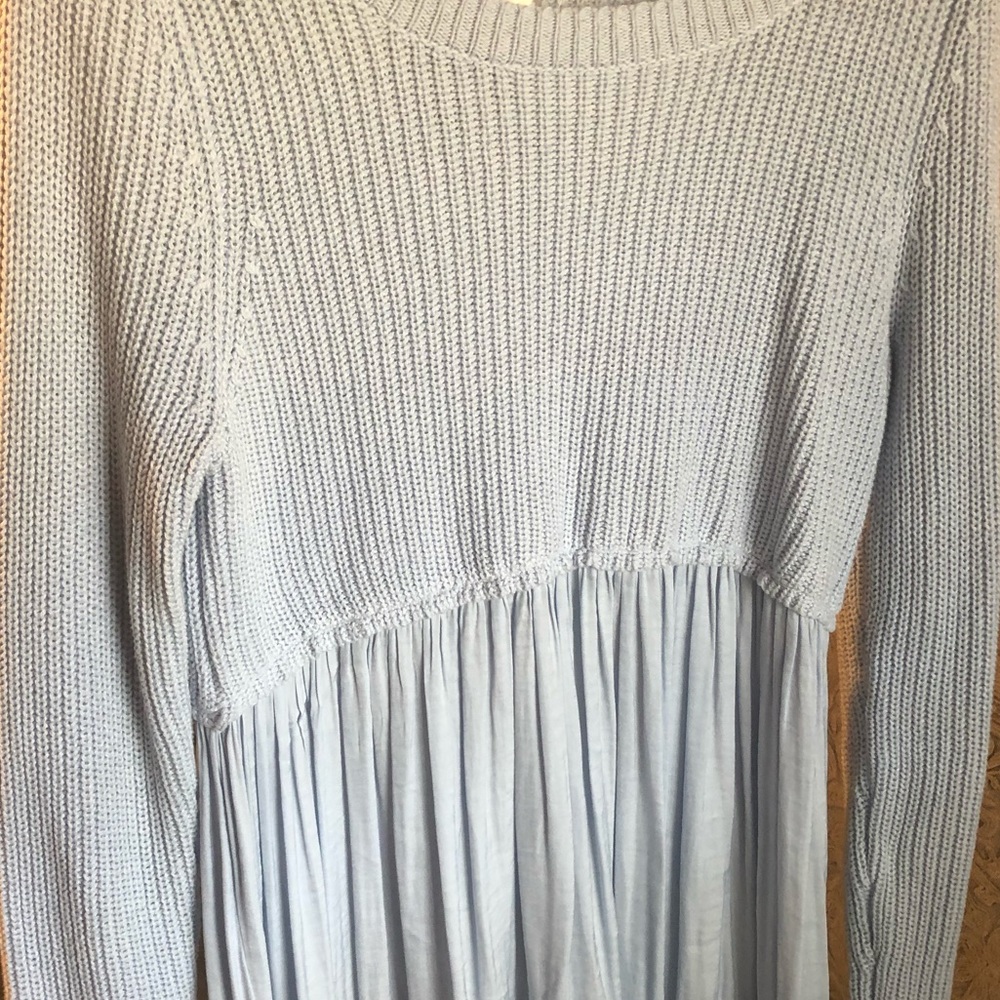 Sky blue sweater with silky base, never worn